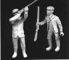 Man shooting gun and his loader