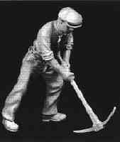 Workman using a pickaxe