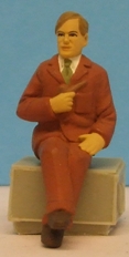 Omen - Seated man holding a pipe