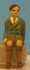 Omen - Seated schoolboy