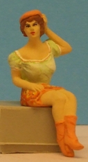 Omen - Seated teenage girl wearing a short-skirt, boots & a beret