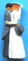 Omen - Wedding couple embracing.