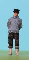 Omen - Fisherman standing wearing a cap & Welligton boots