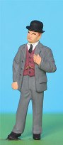 Omen - Distinguished man wearing a suit, waistcoat & bowler.