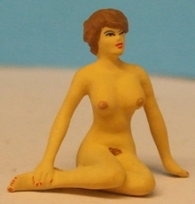Omen - Nude girl, sitting on the ground with legs to one side