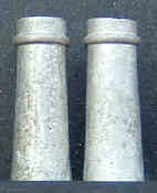 Pair of tall chimney pots with plain top rim