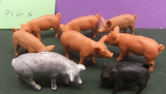 1:43 Unknown Maker = 8 Pigs. 7 Plastic, 1 Metal