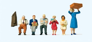 1:45 Figures Seated Passengers x 5, 1 Standing Lifting a case down, 